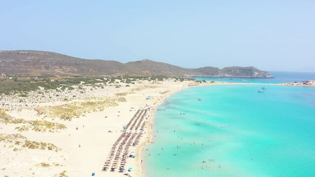 Aerial view of Simos beach in Elafonisos island in Greece. Elafonisos is a small Greek island the Peloponnese with idyllic exotic beaches and crystal clear waters. Laconia, Greece, Europe