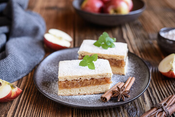 Cinnamon apple pie slices with powdered sugar icing