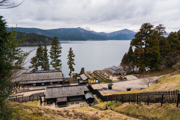 Hakone Tokaido Checkpoint. Edo era restored Japanese medieval pass. Lake Ashi in the backgound, Japan.