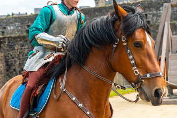 A medieval soldier on horseback at the castle of Fougeres. Brittany region, Ille et Vilaine department, France