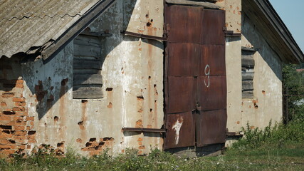 Old hangar with rusty gates