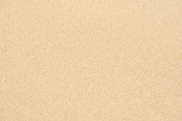 Fototapeta na wymiar Fond couleur sable basé sur une photo de sable à la mer