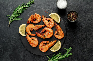 grilled giant prawns on a stone background