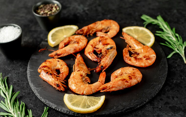 grilled giant prawns on a stone background