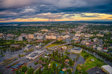 Aerial View of Downtown Fairbanks, Alaska during a stormy Summer Sunset