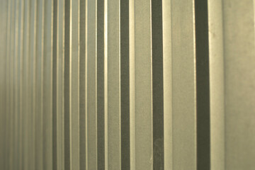 Obraz premium The texture of the metal fence. Stainless steel in sunlight.