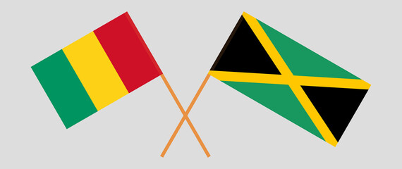 Crossed flags of Guinea and Jamaica. Official colors. Correct proportion