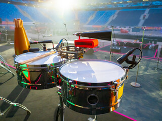 Several drum kits on the stadium stage. Drum set of two baroban. trommelclose up. Concept -...