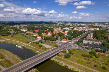Poznan, Polish city during the day. The sun, the old town, the streets of Poznań, the Warta River and bridges over the river. - obrazy, fototapety, plakaty