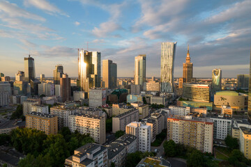Warsaw at sunset. The capital of Poland is illuminated by a beautiful orange sun.