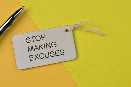 Pen and label tag written with STOP MAKING EXCUSES