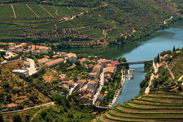 Scenic view of the beautiful Pinhão village surounded by vineyards in the beautiful Douro river valley, Vila Real district, Viseu district, Portugal - obrazy, fototapety, plakaty