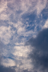 Obraz premium Clouds torn by the wind fly away