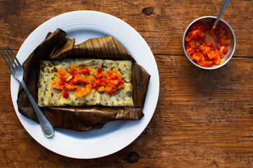 mexican food with sauce from the riviera maya on a wooden table