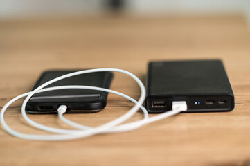 mobile phone charger with power bank. External battery for mobile devices.