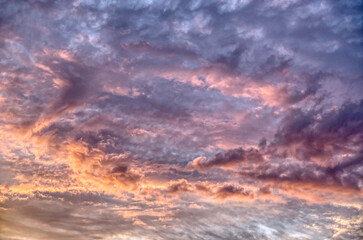 Naklejka premium Violet, pink, orange and blue dream kind of morning clouds 
