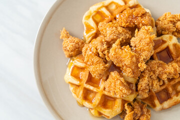 fried chicken waffle with honey or maple syrup