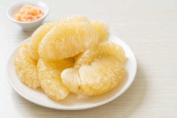 Fresh peeled pomelo, grapefruit or shaddock