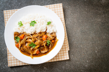 Japanese curry rice with sliced pork, carrot and onions