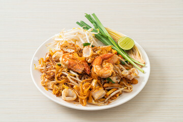 Pad Thai Seafood - Stir fried noodles with shrimps, squid or octopus and tofu