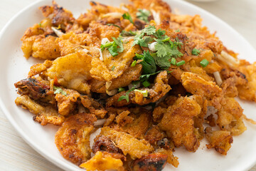 Crispy fried mussel pancake with egg