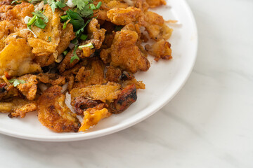 Crispy fried mussel pancake with egg