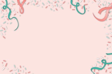 Birthday confetti background with colorful party streamers, candy and confetti making a border on a pink background with image or copy space.