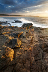 light on rocks on the coast