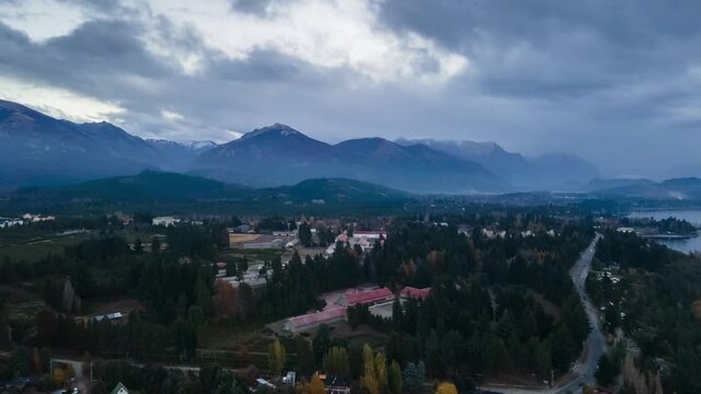 A cloudy day in San Carlos de Bariloche. Aerial images of Catedral, Bella Vista and Lopez hills, Bustillo avenue and Nahuel Huapi lake.