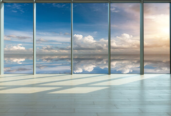   Through the floor-to-ceiling windows, the outdoor sky cloudscape and lake reflection