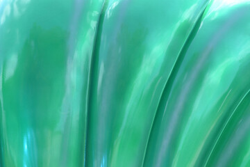 Blue-green mother-of-pearl background, painted texture