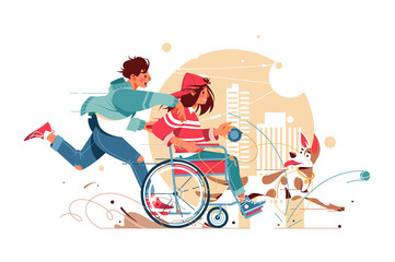 Guy and a woman in wheelchair