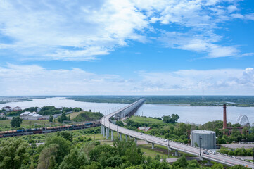 Obraz premium Khabarovsk, Russia, July 8, 2021: Bridge over the Amur River summer landscape