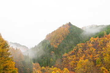 Kamikochi National Park in the Northern Japan Alps of Nagano Prefecture, Japan. Beautiful mountain in autumn leaf with river.