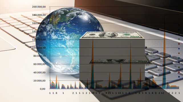 Glass globe and dollars on the computer keyboard with binary code "Elements of this image furnished by NASA "