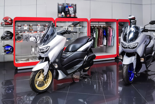 KANCHANABURI, THAILAND -JUNE 10, 2021 : Special discounted new Yamaha motorcycles and accessories for sale at Yamaha motorcycle shop in Tha Muang district, Kanchanaburi Thailand.
