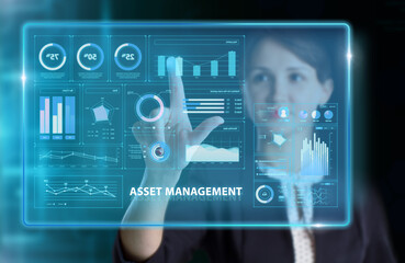 Business, Technology, Internet and network concept. Young businessman working on a virtual screen of the future and sees the inscription: Asset management