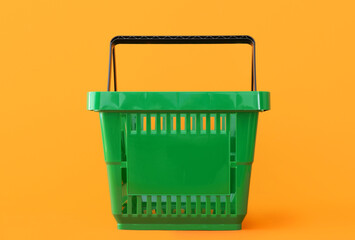 Fototapeta premium Shopping basket on color background