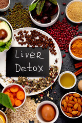 Best products for healthy liver on dark gray background. Clean eating concept.