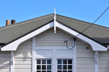 Detail of vintage wooden well preserved post office building in Birkenhead.