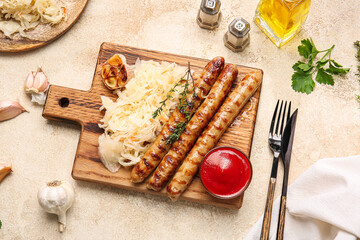 Board with tasty sauerkraut, grilled sausages and sauce on grunge background