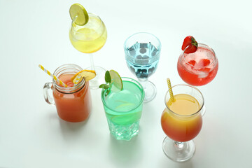 Set of fresh cocktails on white background