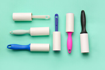 Different lint rollers on color background