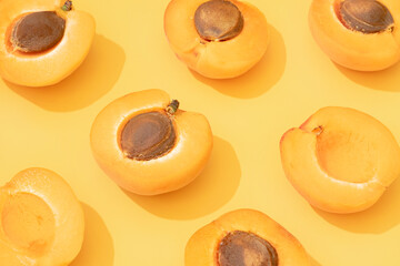 Apricots pattern on a yellow background.
