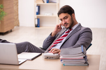 Young businessman employee working in the office