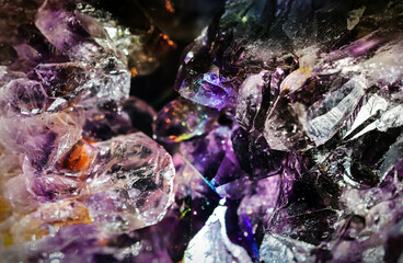 Crystal magic Quartz gem stone. Iridescent crystals. Sparkly texture of specimen with reflected luster light effect.