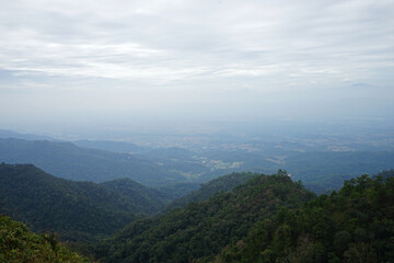 Fototapeta premium Natural landscape of green mountain range with cloudy blue sky