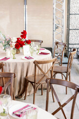 Boho wedding chair with decor for guests.
