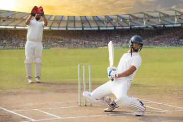 Batsman avoids a bouncer during a match in the stadium