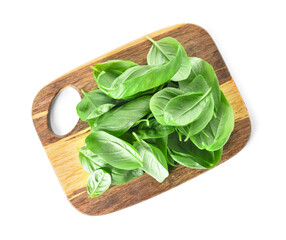 Board with fresh basil leaves on white background